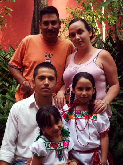 Margaret Acuitlapa, top right, her husband Jose, top left, and their three children. The Acuitlapas decided to move their mostly American family to Mexico in order to stay together after Jose was deported.